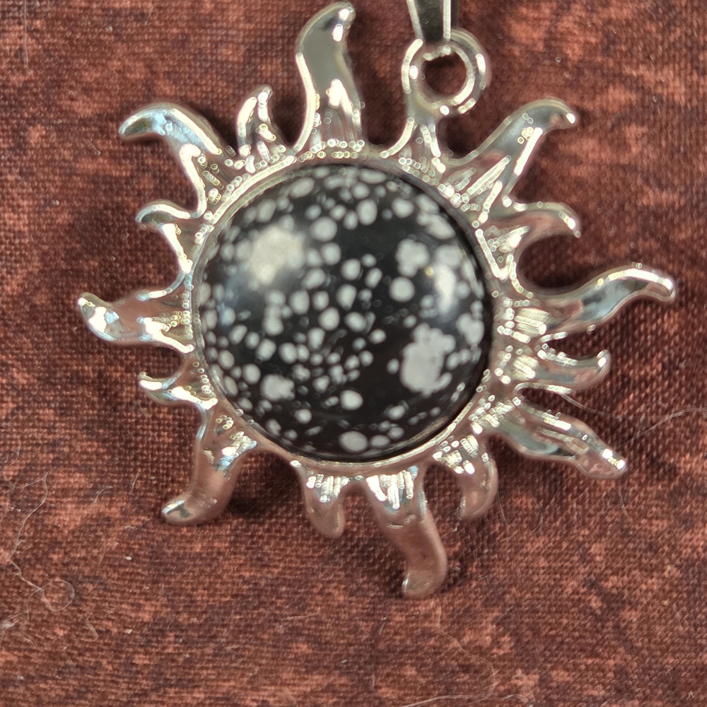 Silver Sunburst Pendant with Black and White Stone